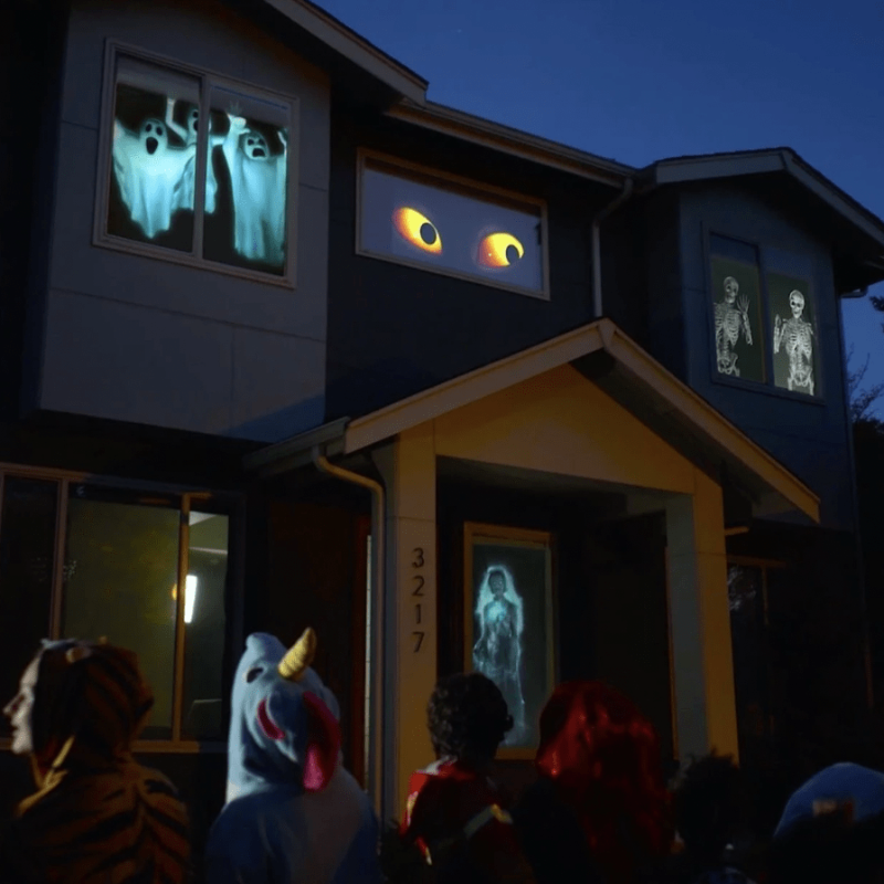 Halloween & Christmas Window Projector (12 Movies Included)